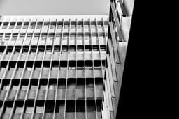 grayscale photography of high-rise building — Photo Amy Chen / Unsplash