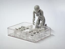 a small plastic man standing on a table — Photo Brett Jordan / Unsplash