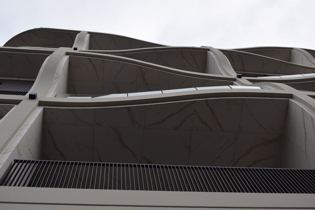 a close up of a building with a sky background — Photo Marija Zaric / Unsplash