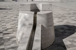 a concrete structure on a sidewalk — Photo Zack Yeo / Unsplash