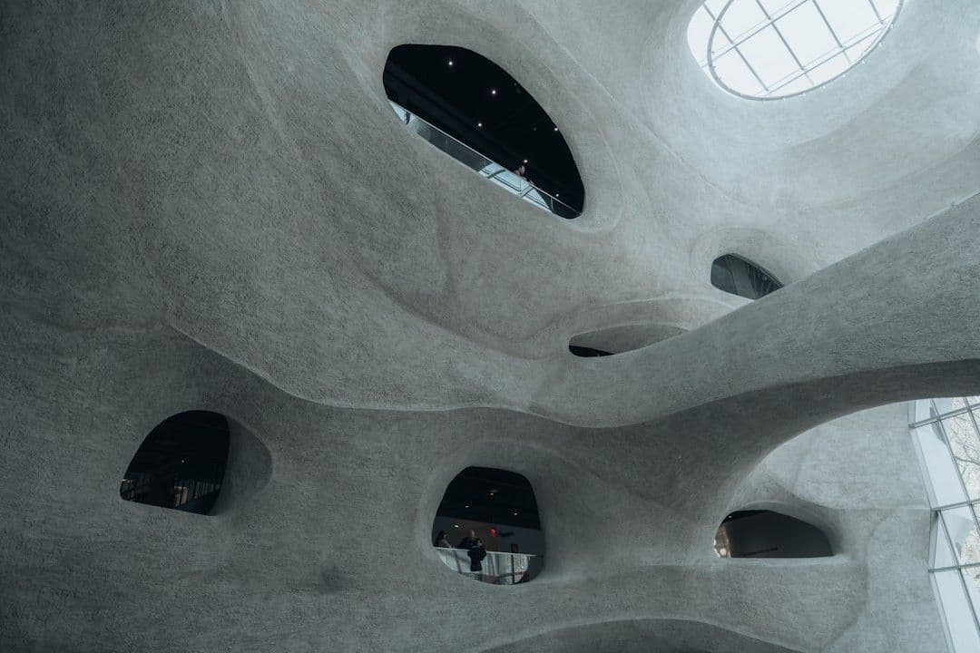 A modern architectural ceiling with unique windows. — Photo Y M / Unsplash