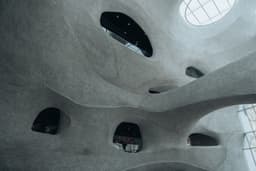 A modern architectural ceiling with unique windows. — Photo Y M / Unsplash
