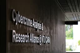 Cybercrime Analysis & research Alliance building — Photo Wendy Tan / Unsplash