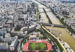 Drone shot Paris city — Photo Jace & Afsoon / Unsplash