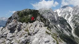 a man standing on top of a rocky mountain — Photo Pau de Valencia / Unsplash