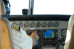 Pilot Flying Small Plane Over Hawaii — Photo Kevin Bluer / Unsplash