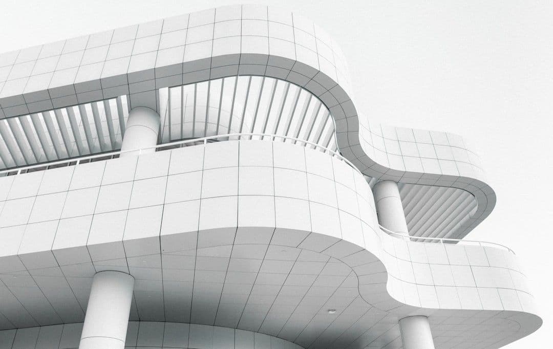 Modern building with a wave shaped exterior
— Photo Mika Ruusunen / Unsplash