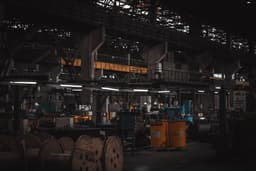 A factory filled with lots of machines and machinery — Photo Shavr IK / Unsplash