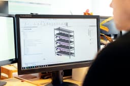 Male design engineer designs vertical farming solutions — Photo ThisisEngineering / Unsplash