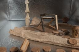 Miniature diorama with cardboard and wood elements. — Photo Tobias Doering / Unsplash