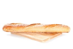 A loaf of bread sitting on top of a cutting board — Photo Maria Kovalets / Unsplash