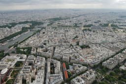 an aerial view of the city of paris — Photo Danielle Barnes / Unsplash