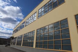 a building with many windows and a sky background — Photo Christer Lässman / Unsplash