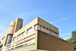 low angle photography of concrete building — Photo Lieselotte De Bie / Unsplash