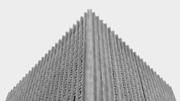 a black and white photo of a tall building — Photo TheVesperStar / Unsplash