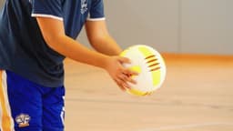 a person holding a ball — Photo Estanislau Valmaña / Unsplash