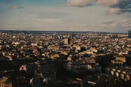 a view of a city from the top of a building — Photo Erwan Hesry / Unsplash