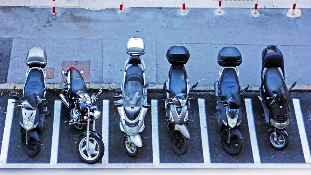 a row of motorcycles parked next to each other — Photo boris misevic / Unsplash