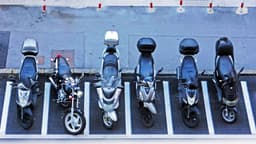 a row of motorcycles parked next to each other — Photo boris misevic / Unsplash