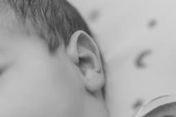 a close up of a baby's ear — Photo Laura Ohlman / Unsplash
