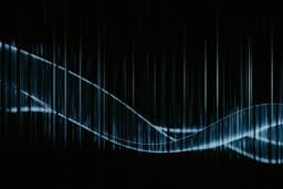 A black background with a blue wave on it — Photo Pawel Czerwinski / Unsplash