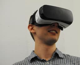 man wearing VR glass headset — Photo Hammer & Tusk / Unsplash